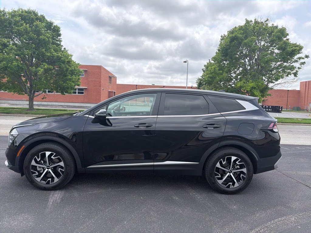 2024 Ebony Black Kia Sportage EX FWD SUV