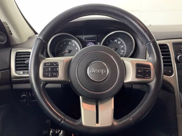 2011 Blackberry Pearlcoat Jeep Grand Cherokee Laredo 4X4 SUV