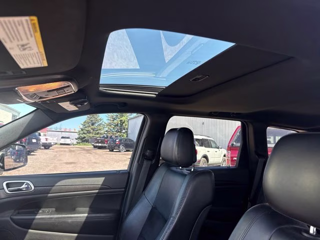 2015 Brilliant Black Crystal Pearlcoat Jeep Grand Cherokee Altitude Edition 4X4 SUV