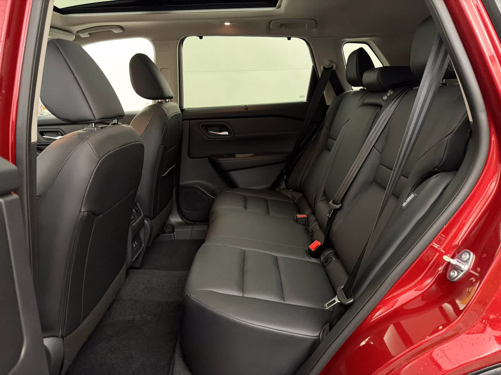 2025 Scarlet Ember Tintcoat Nissan Rogue SV FWD SUV