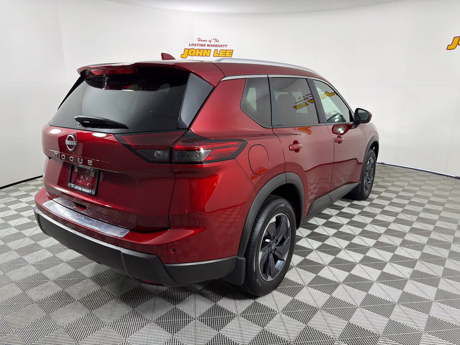 2025 Scarlet Ember Tintcoat Nissan Rogue SV FWD SUV