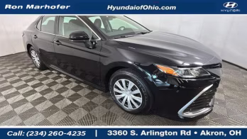 2023 Midnight Black Metallic Toyota Camry Hybrid LE FWD Sedan