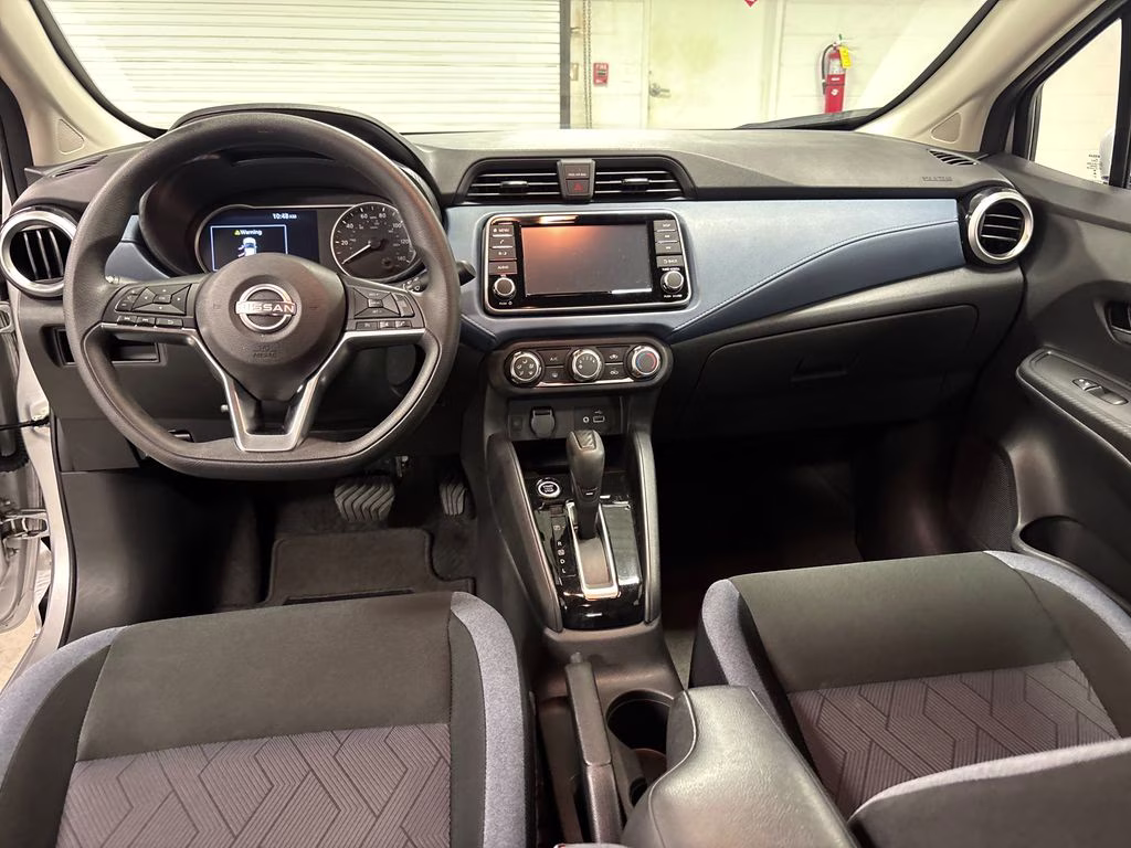 2025 Brilliant Silver Metallic Nissan Versa 1.6 SV FWD Sedan