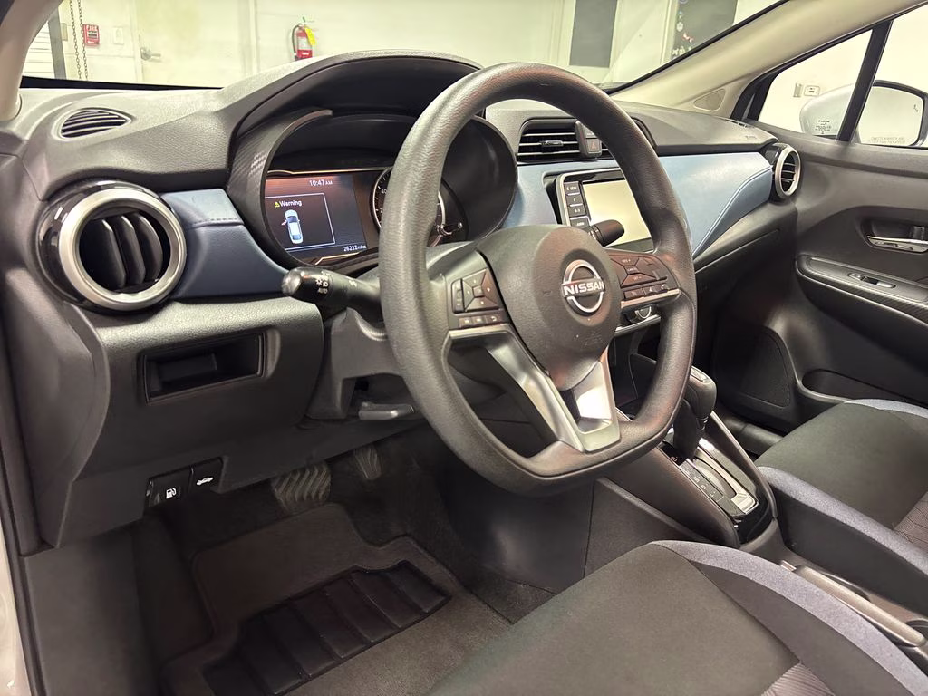2025 Brilliant Silver Metallic Nissan Versa 1.6 SV FWD Sedan