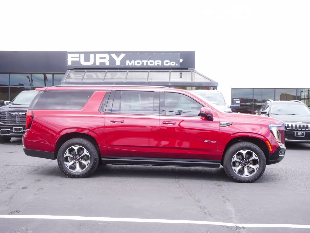 2025 Volcanic Red Tintcoat GMC Yukon XL AT4 Ultimate 4X4 SUV