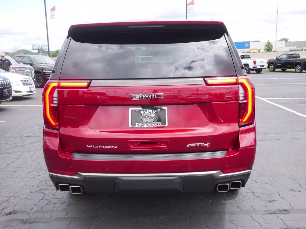 2025 Volcanic Red Tintcoat GMC Yukon XL AT4 Ultimate 4X4 SUV