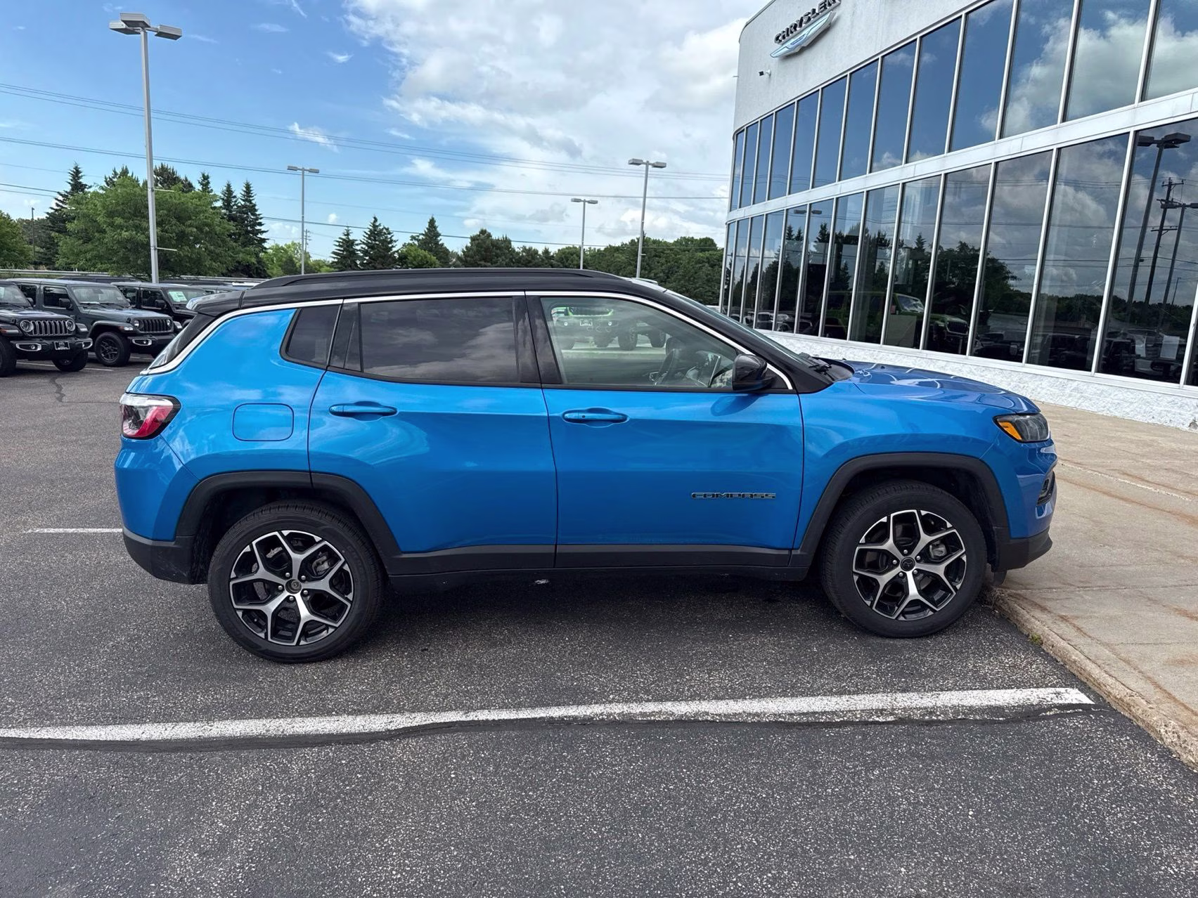 2025 Hydro Blue Pearlcoat Jeep Compass Limited 4X4 SUV