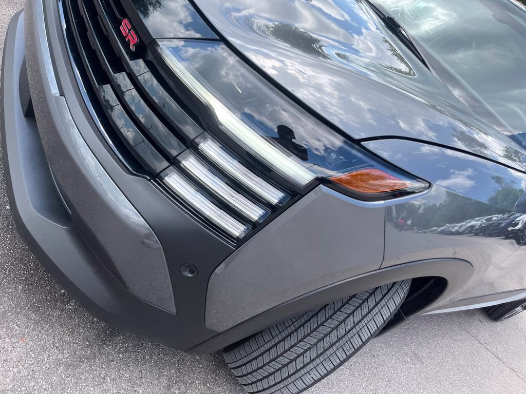 2025 Gun Metallic/Super Black Nissan Kicks SR AWD SUV