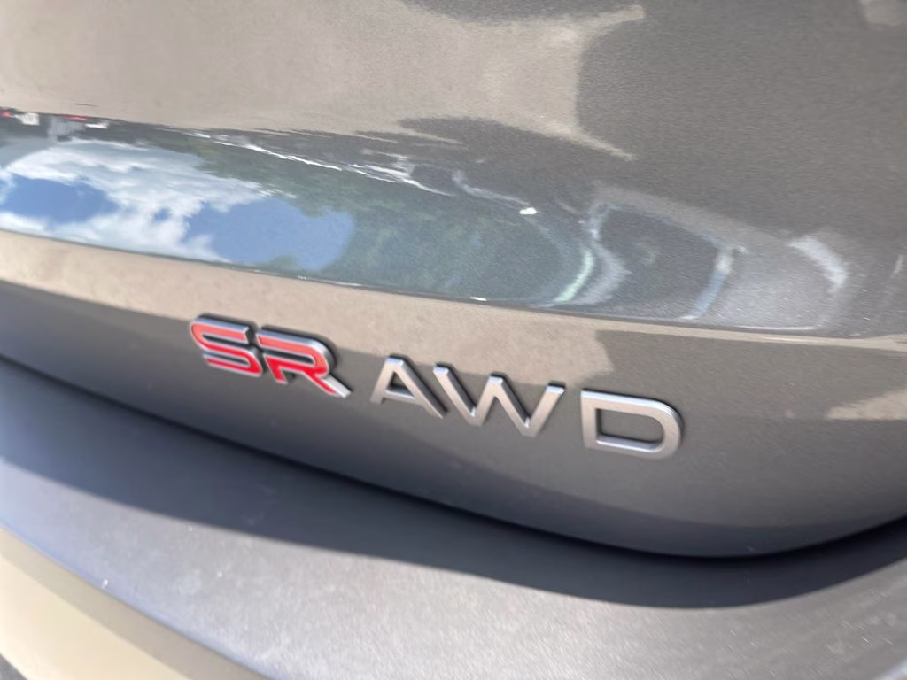 2025 Gun Metallic/Super Black Nissan Kicks SR AWD SUV