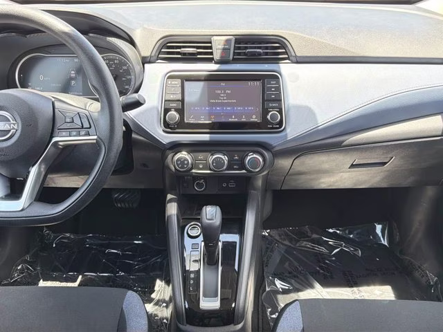 2024 Aspen White Tricoat Nissan Versa 1.6 SV FWD Sedan