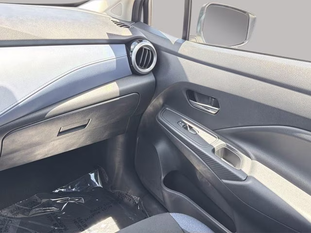 2024 Aspen White Tricoat Nissan Versa 1.6 SV FWD Sedan