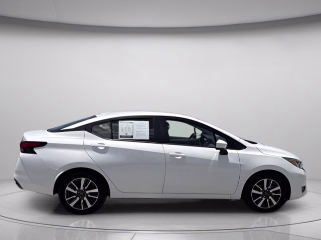2024 Aspen White Tricoat Nissan Versa 1.6 SV FWD Sedan