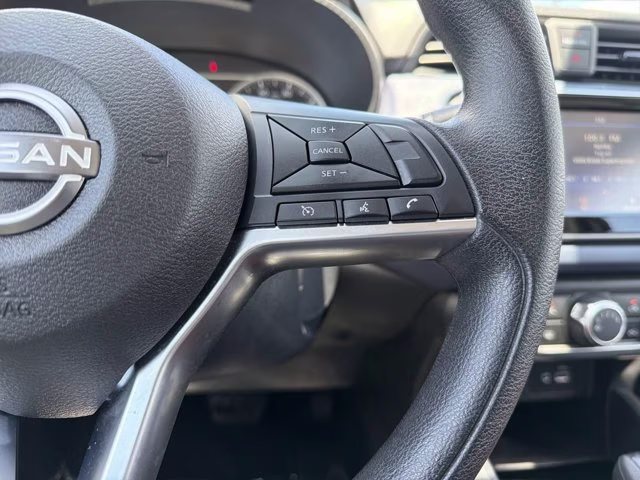 2024 Aspen White Tricoat Nissan Versa 1.6 SV FWD Sedan