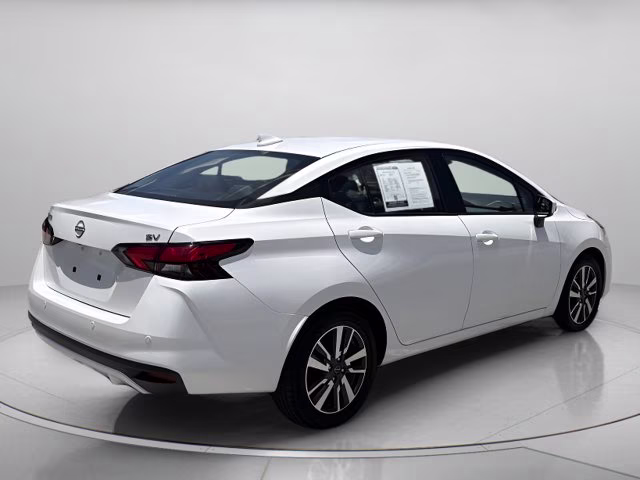 2024 Aspen White Tricoat Nissan Versa 1.6 SV FWD Sedan