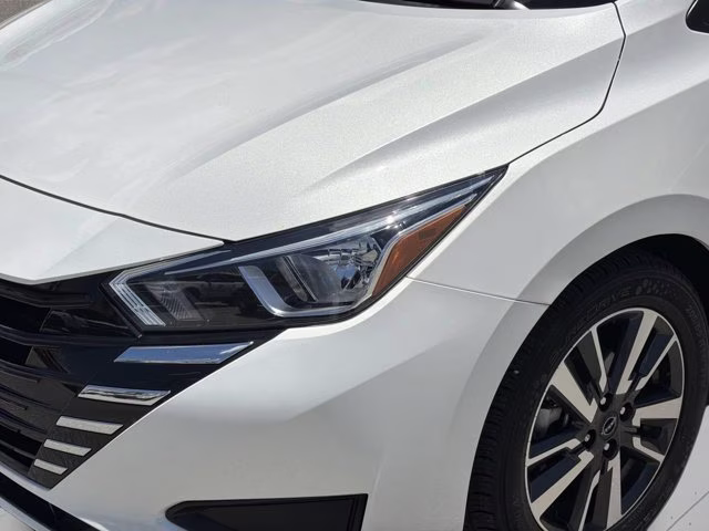 2024 Aspen White Tricoat Nissan Versa 1.6 SV FWD Sedan