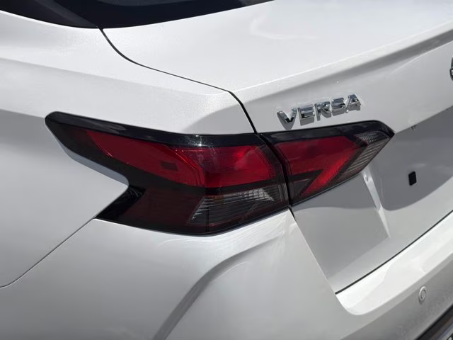 2024 Aspen White Tricoat Nissan Versa 1.6 SV FWD Sedan