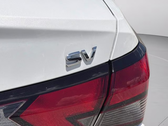 2024 Aspen White Tricoat Nissan Versa 1.6 SV FWD Sedan