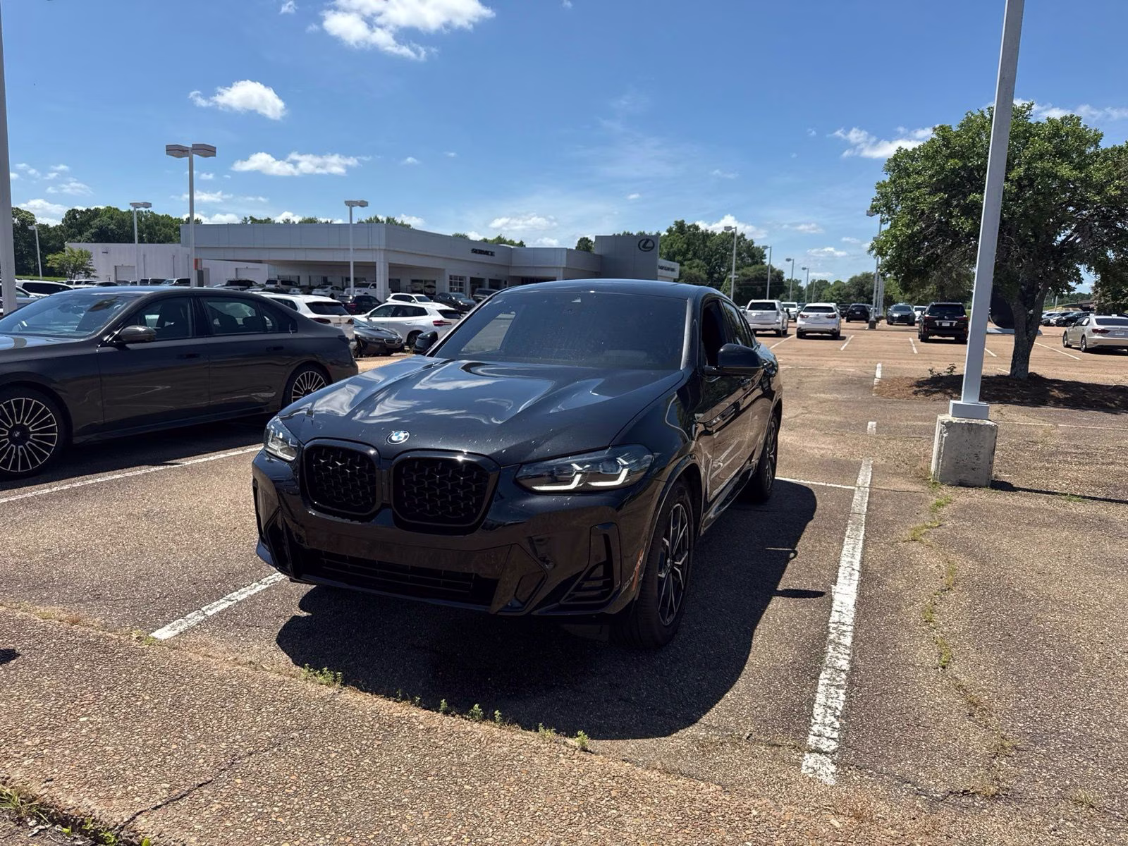 2023 Black Sapphire Metallic BMW X4 xDrive30i AWD SUV