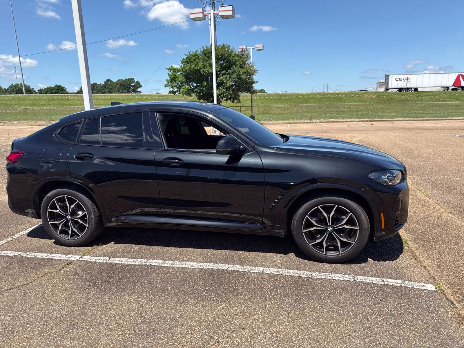 2023 Black Sapphire Metallic BMW X4 xDrive30i AWD SUV