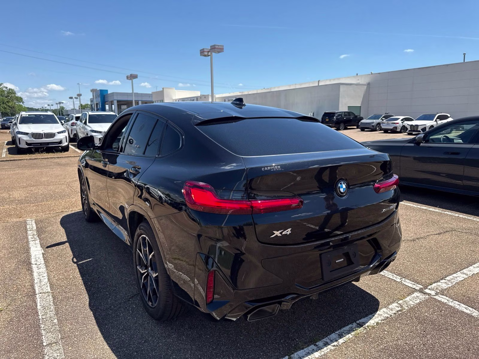 2023 Black Sapphire Metallic BMW X4 xDrive30i AWD SUV