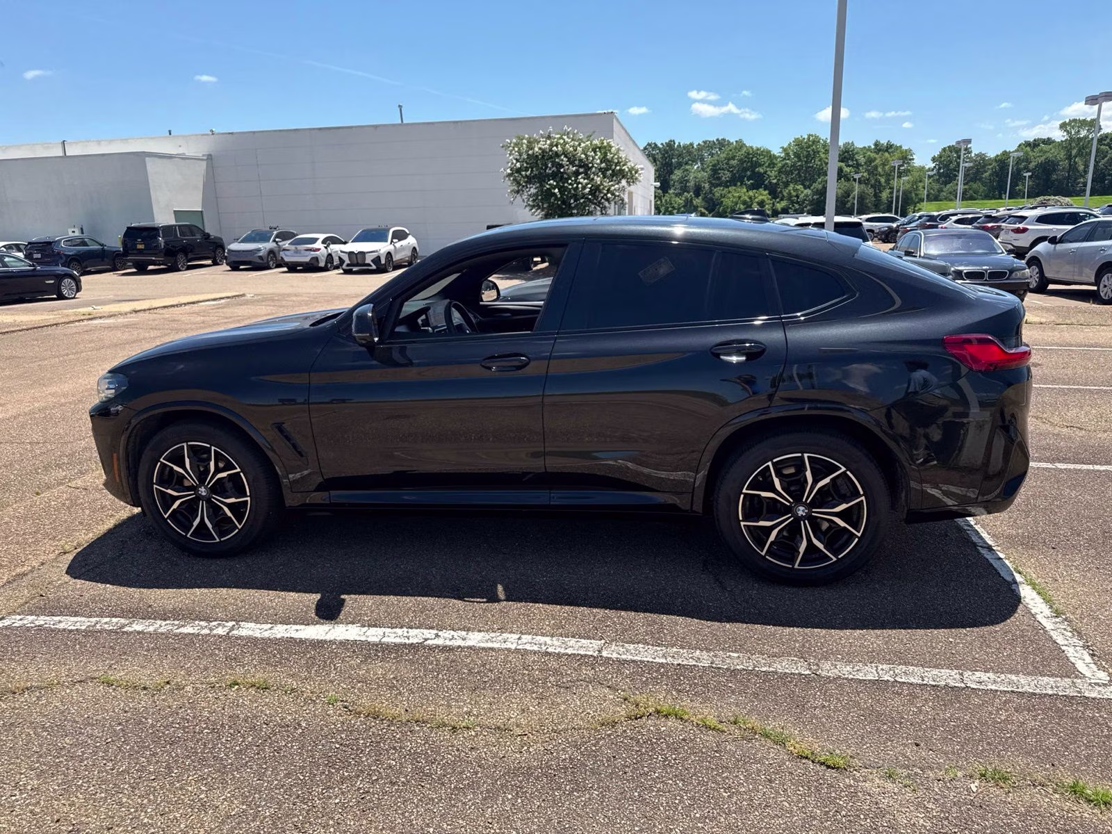 2023 Black Sapphire Metallic BMW X4 xDrive30i AWD SUV