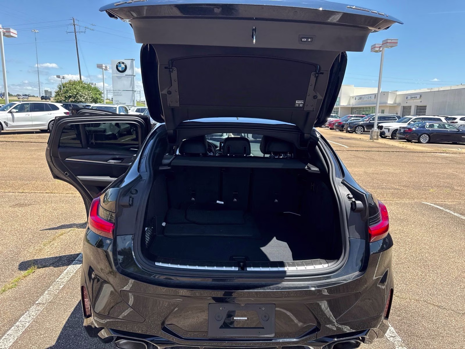 2023 Black Sapphire Metallic BMW X4 xDrive30i AWD SUV
