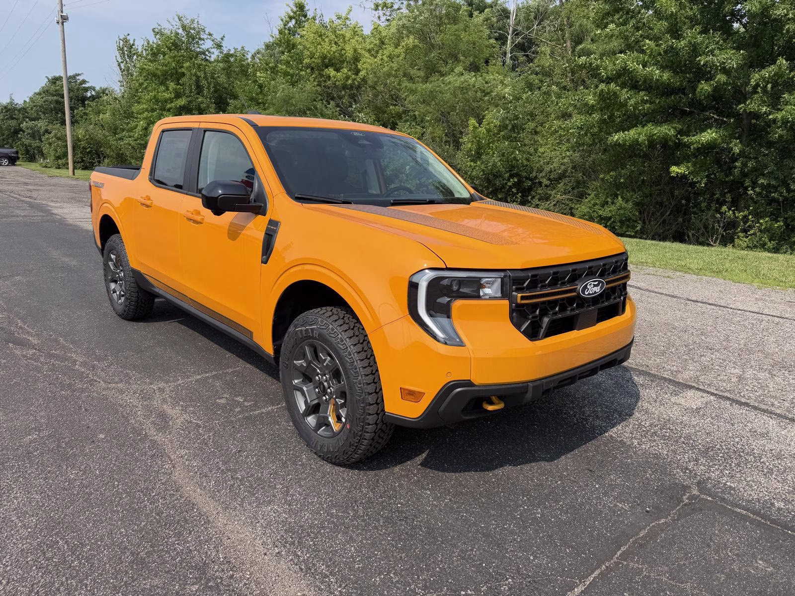 2026 Orange Fury Metallic Tri-Coat Ford Maverick Tremor AWD Truck