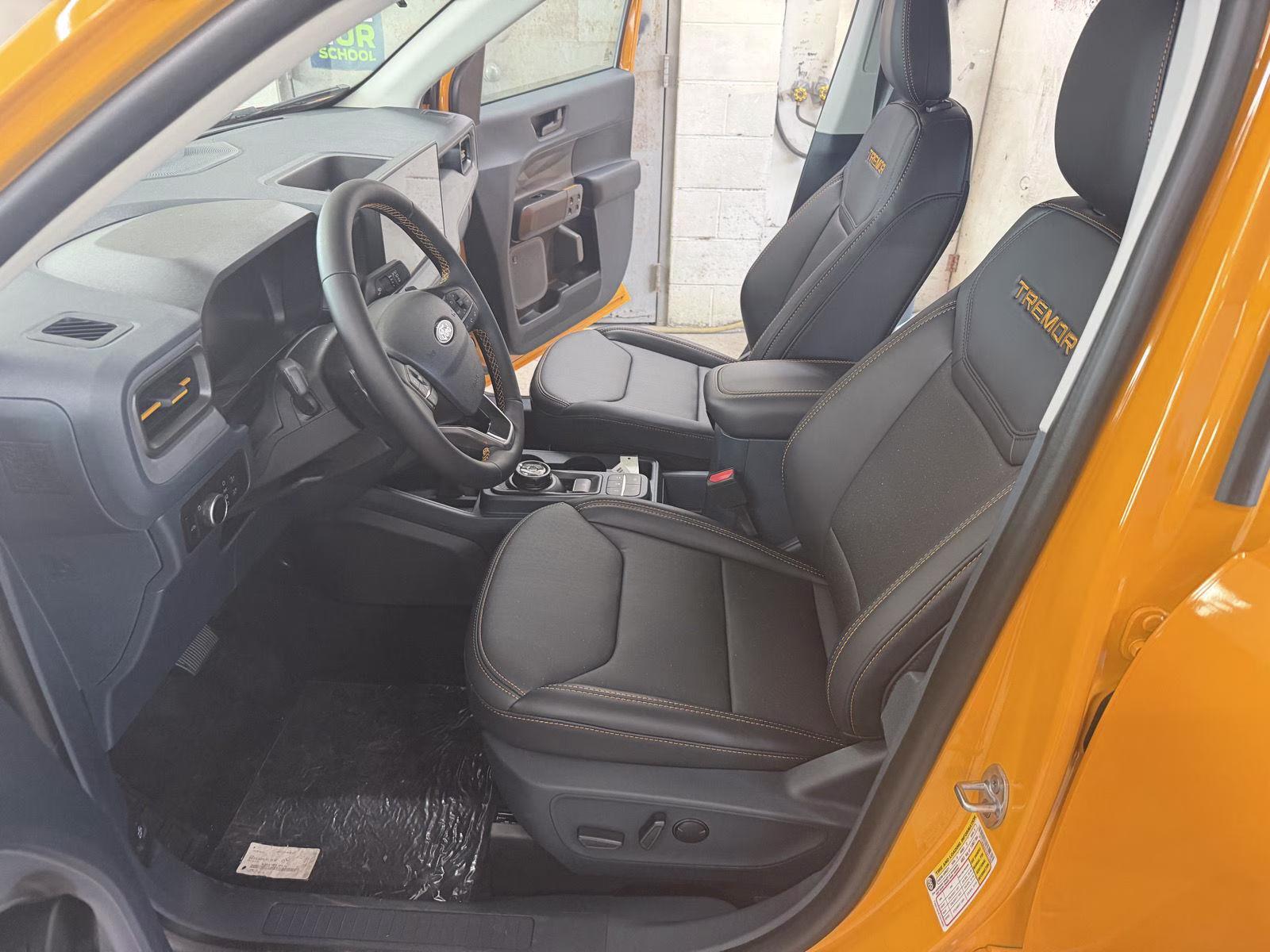 2026 Orange Fury Metallic Tri-Coat Ford Maverick Tremor AWD Truck