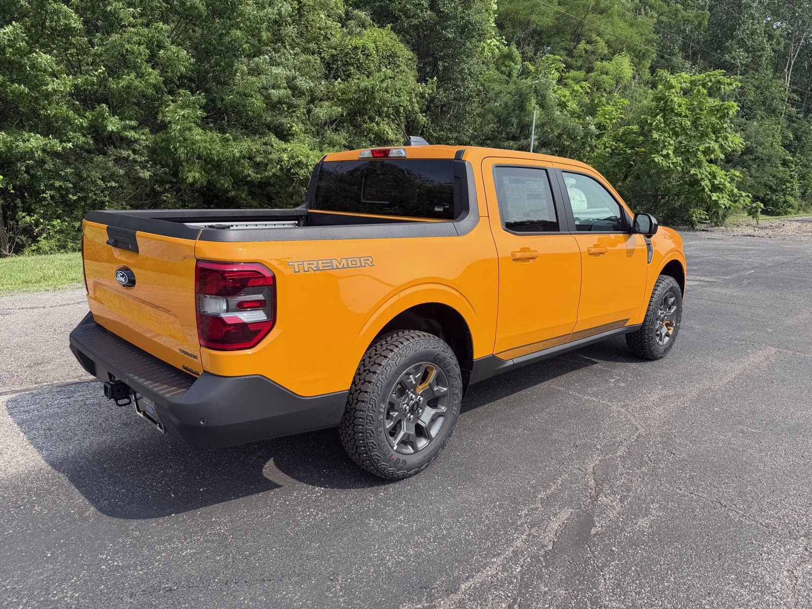 2026 Orange Fury Metallic Tri-Coat Ford Maverick Tremor AWD Truck