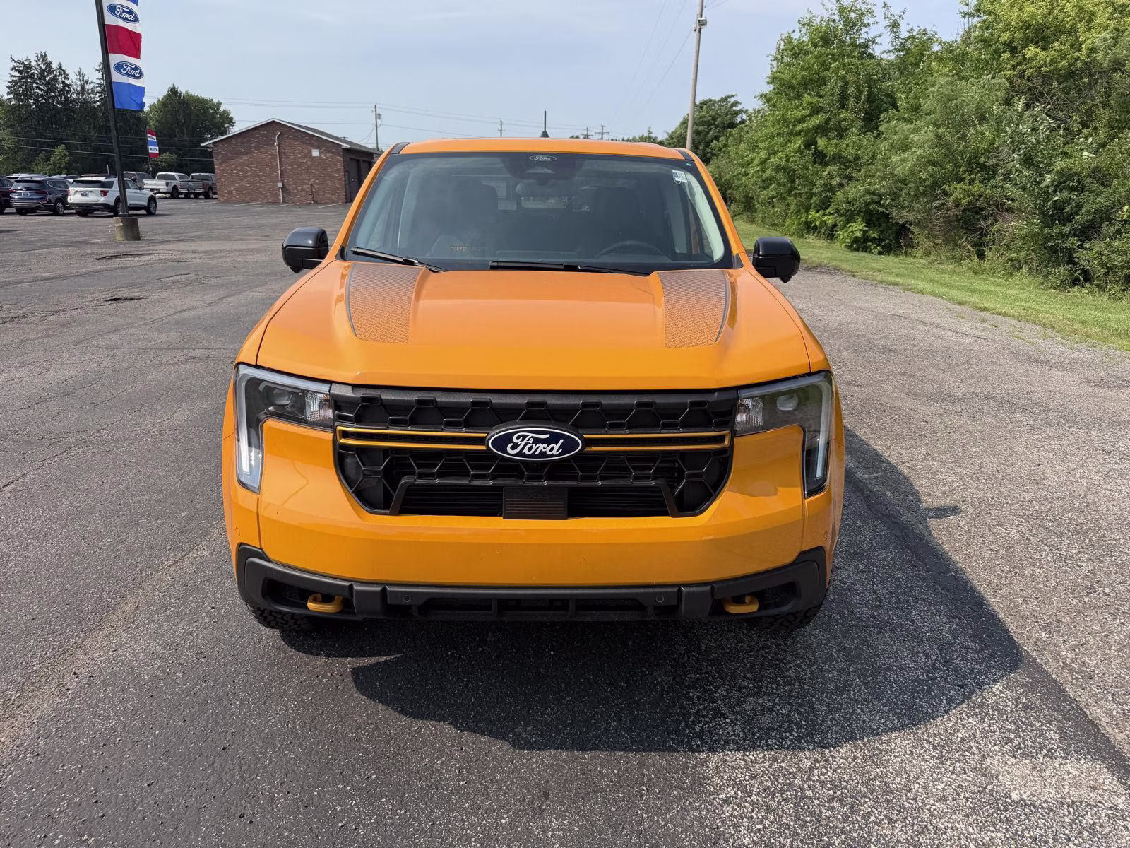 2026 Orange Fury Metallic Tri-Coat Ford Maverick Tremor AWD Truck
