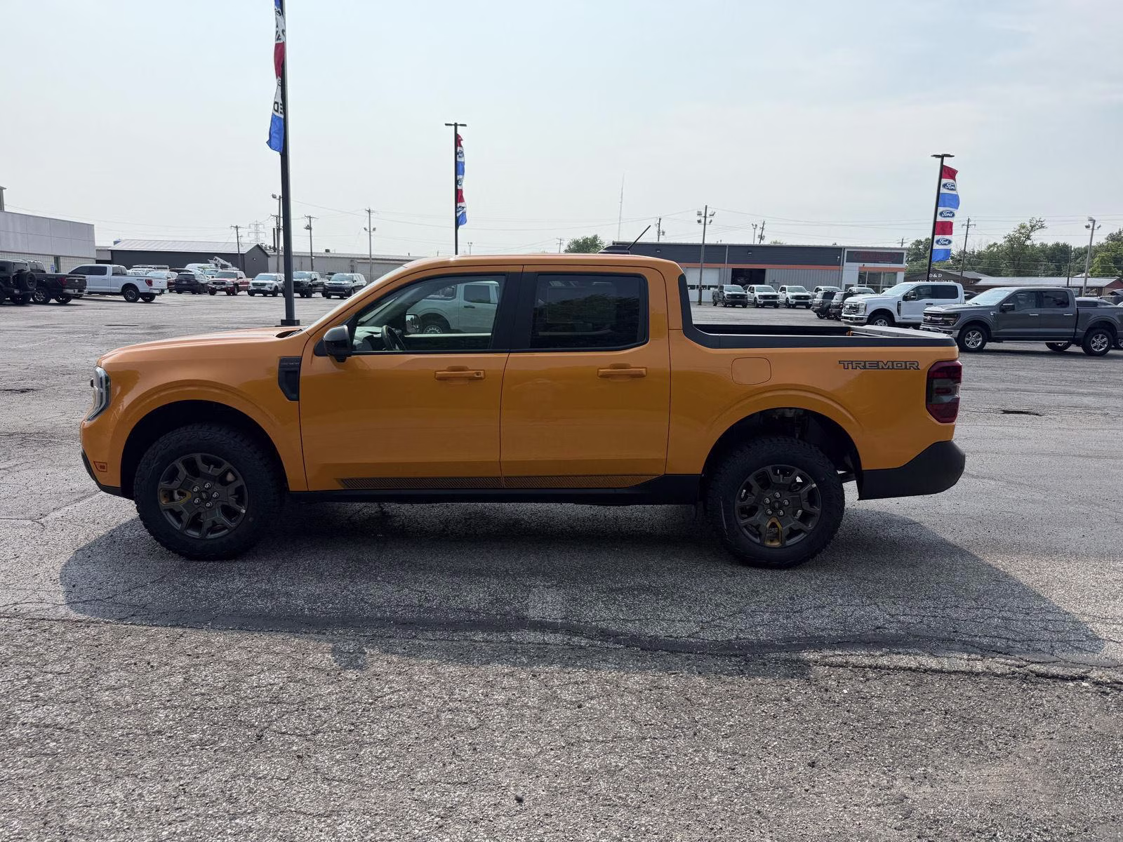2026 Orange Fury Metallic Tri-Coat Ford Maverick Tremor AWD Truck