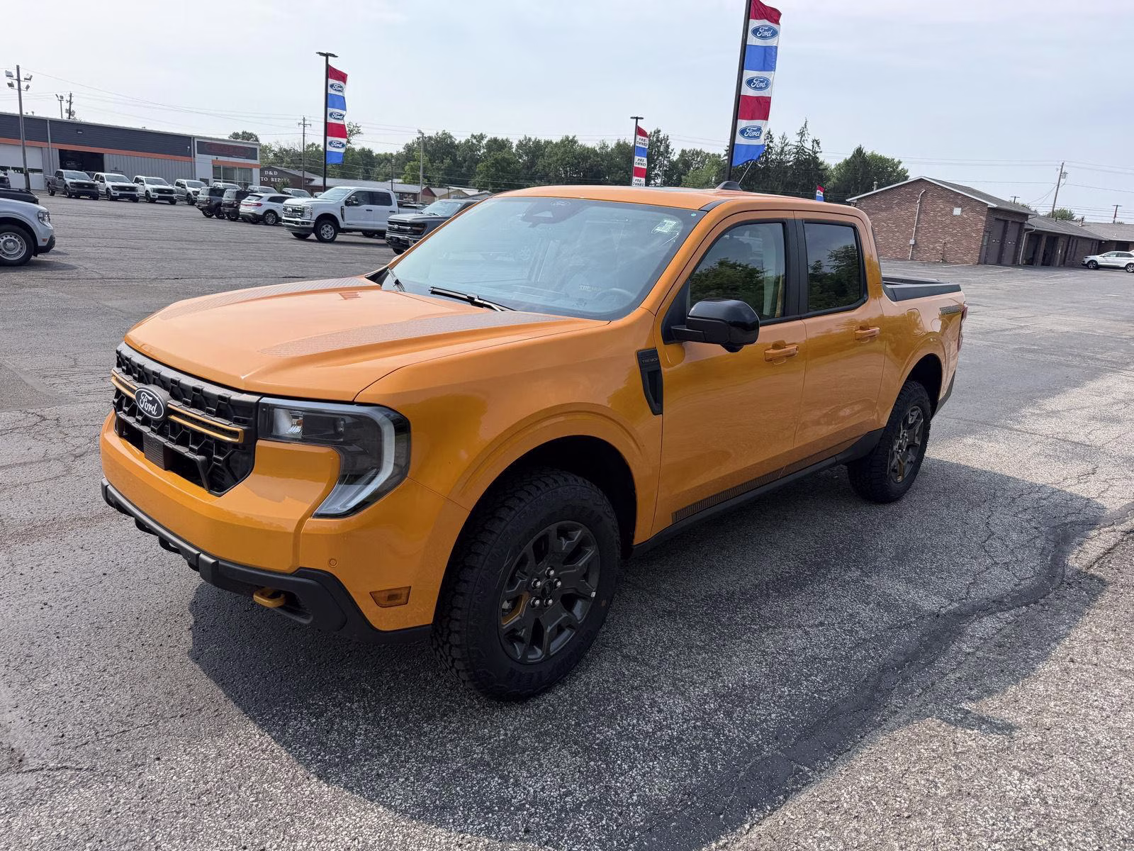 2026 Orange Fury Metallic Tri-Coat Ford Maverick Tremor AWD Truck