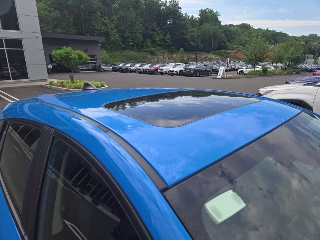 2024 Oasis Blue Pearl Subaru Impreza Sport AWD Hatchback