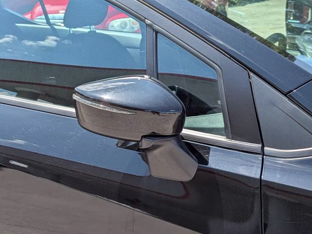 2024 Super Black Metallic Nissan Versa 1.6 SR FWD Sedan