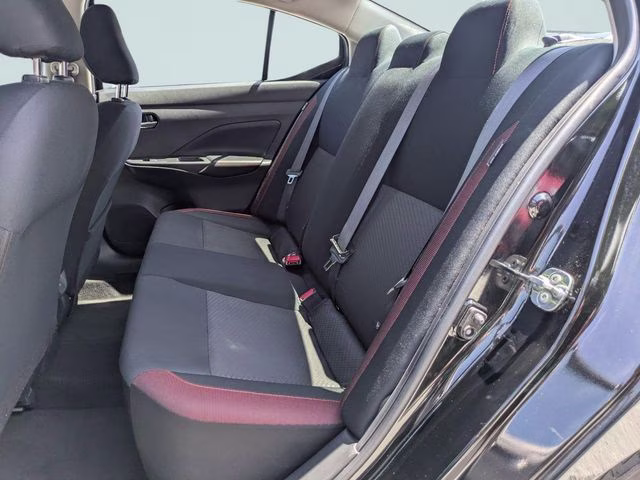 2024 Super Black Metallic Nissan Versa 1.6 SR FWD Sedan