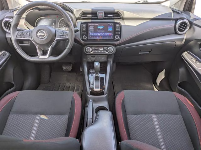 2024 Super Black Metallic Nissan Versa 1.6 SR FWD Sedan