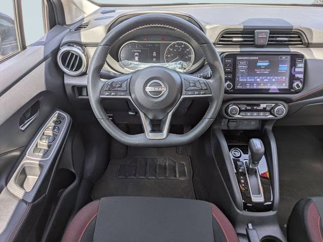 2024 Super Black Metallic Nissan Versa 1.6 SR FWD Sedan