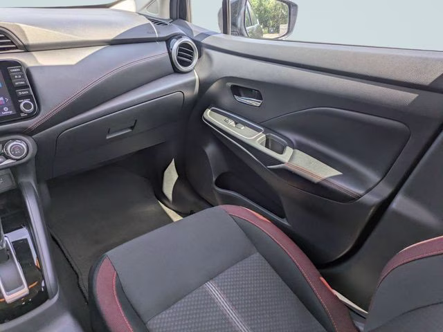 2024 Super Black Metallic Nissan Versa 1.6 SR FWD Sedan