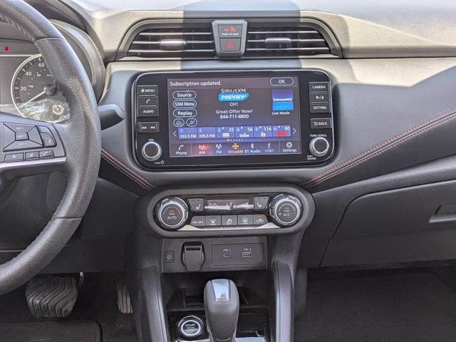 2024 Super Black Metallic Nissan Versa 1.6 SR FWD Sedan