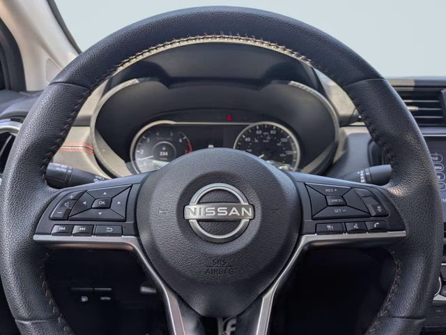 2024 Super Black Metallic Nissan Versa 1.6 SR FWD Sedan