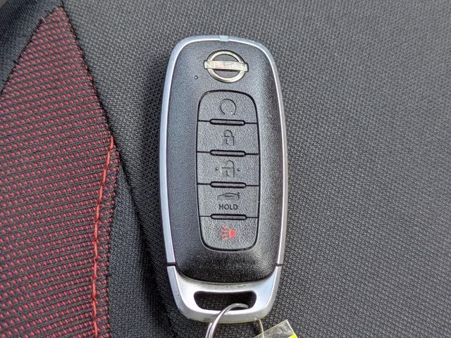 2024 Super Black Metallic Nissan Versa 1.6 SR FWD Sedan