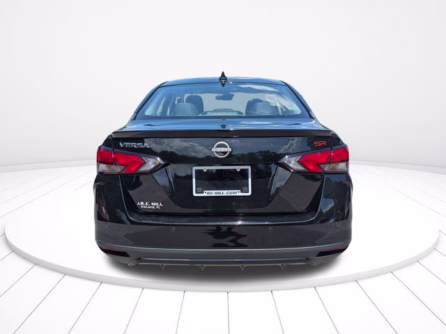 2024 Super Black Metallic Nissan Versa 1.6 SR FWD Sedan
