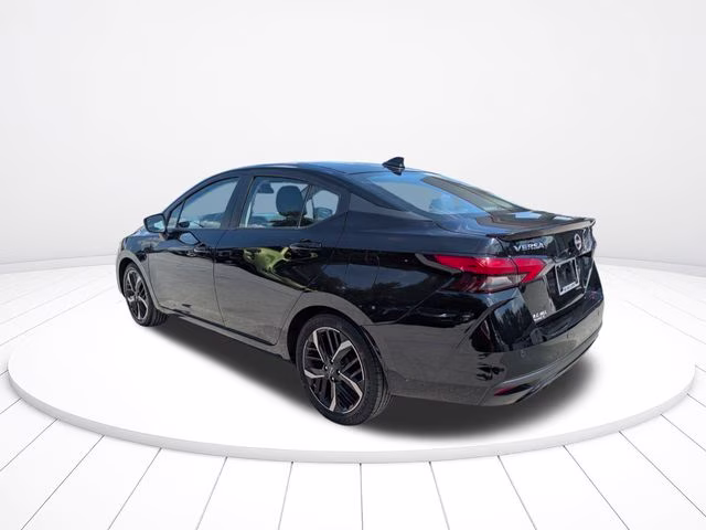2024 Super Black Metallic Nissan Versa 1.6 SR FWD Sedan