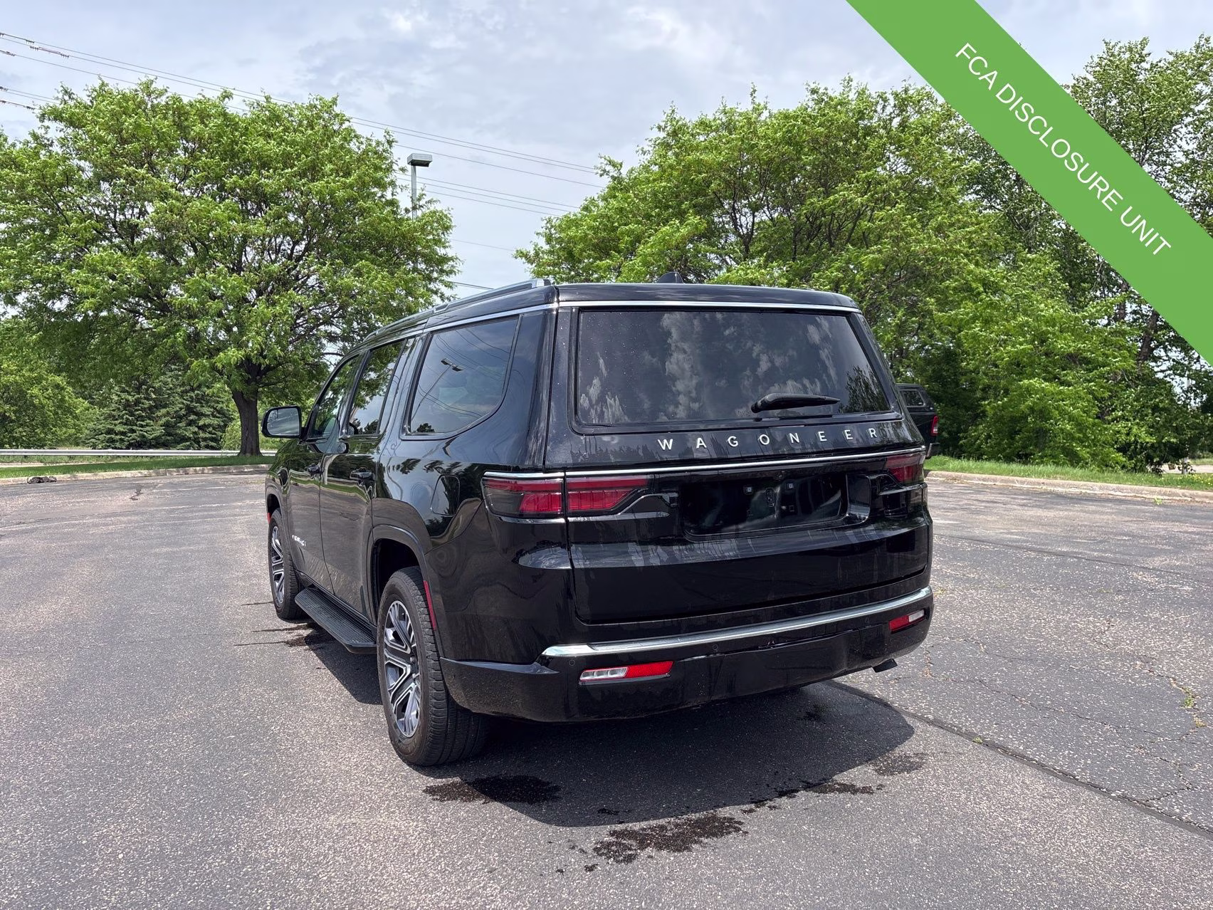 2024 Diamond Black Crystal Pearlcoat Jeep Wagoneer Base 4X4 SUV