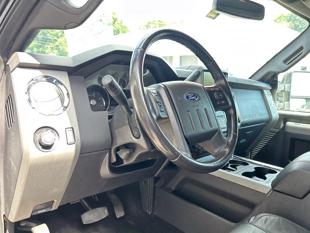 2016 Ingot Silver Metallic Ford Super Duty F-250 SRW Lariat 4X4 Truck