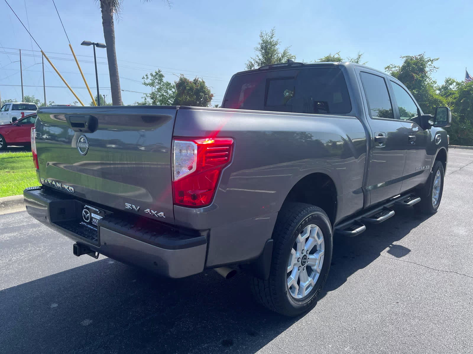2024 Gun Metallic Nissan Titan XD SV 4X4 Truck