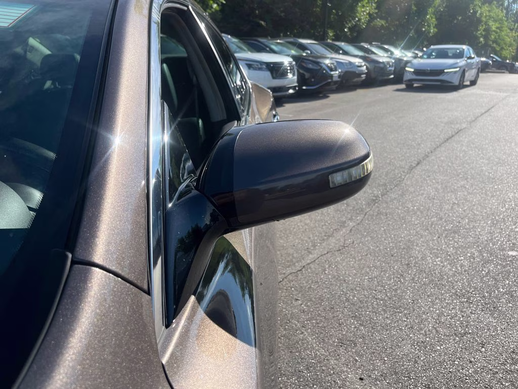 2014 Java Metallic Nissan Maxima 3.5 SV FWD Sedan