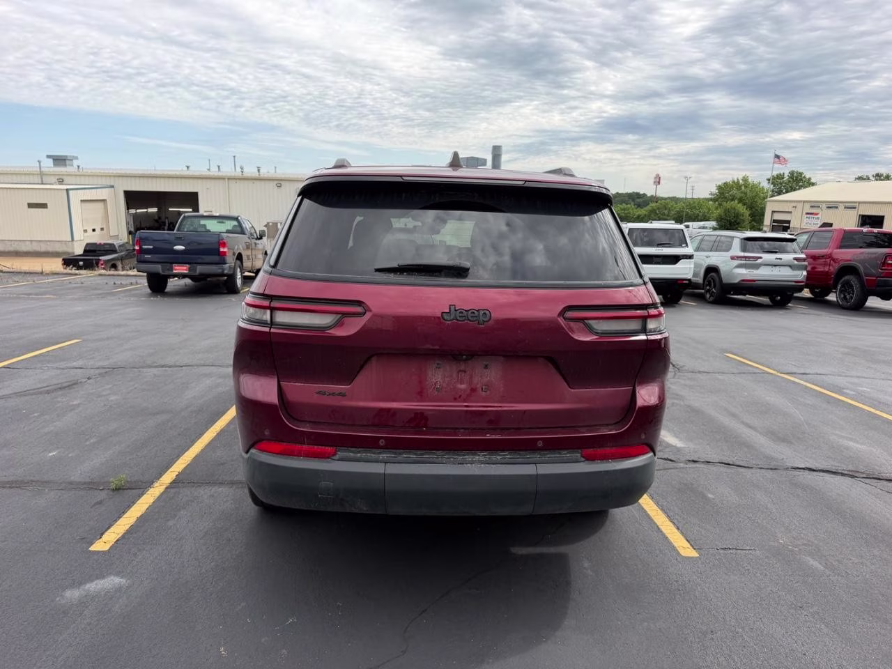 2023 Velvet Red Pearlcoat Jeep Grand Cherokee L 4WD Altitude 4X4 SUV