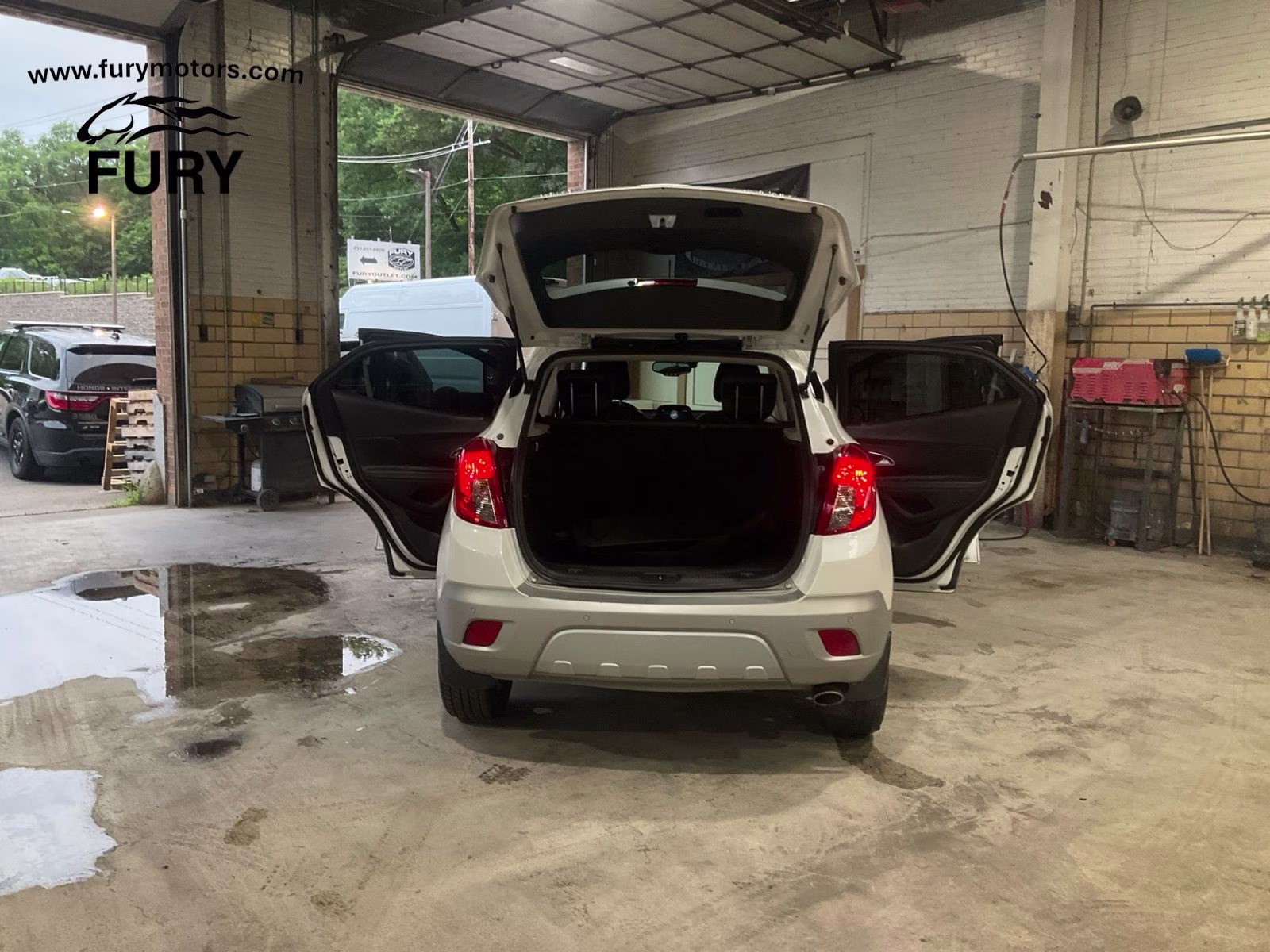 2015 White Pearl Metallic Buick Encore Premium AWD SUV
