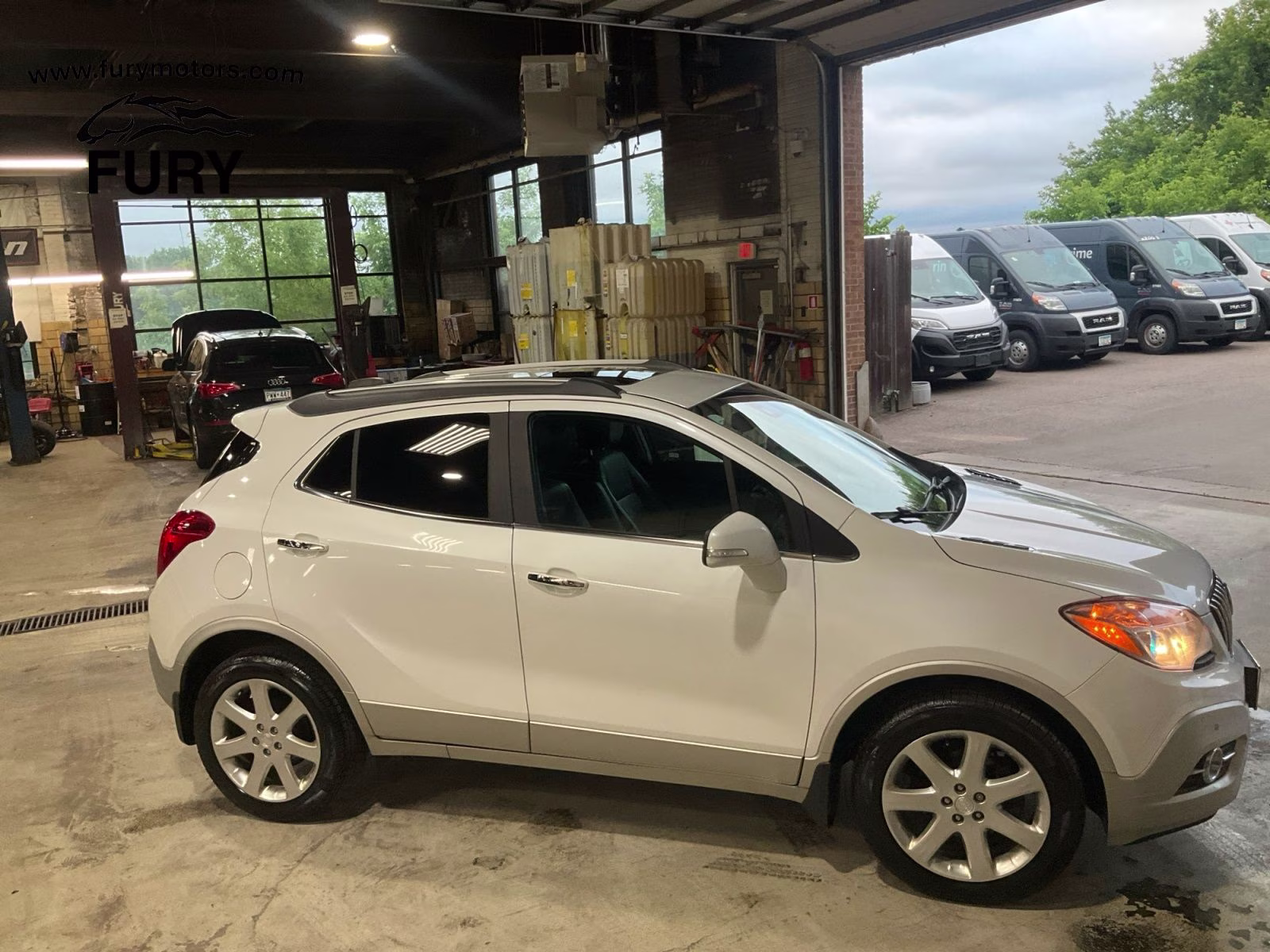 2015 White Pearl Metallic Buick Encore Premium AWD SUV